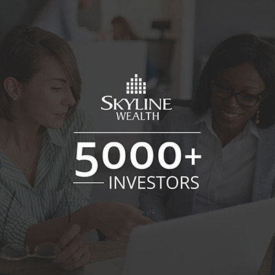 Skyline Wealth 5000+ Logo With Customer Client Back Drop